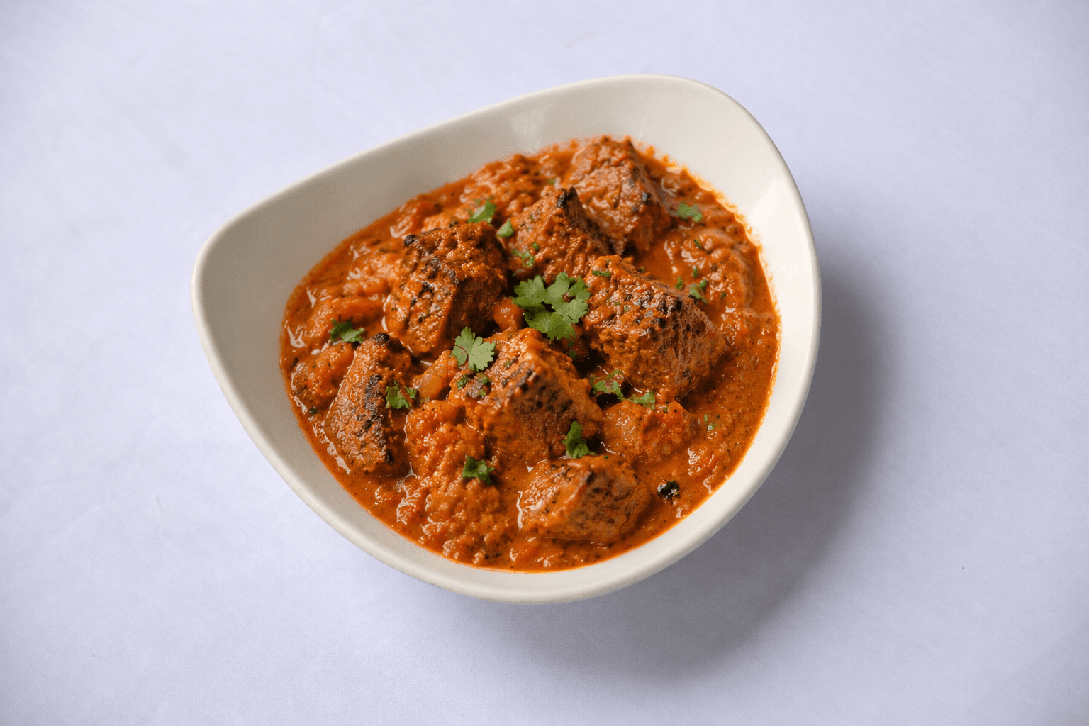 Lamb Tikka Masala, served at India Oven Sacramento